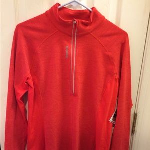 Red 1/4 zip Reebok running shirt